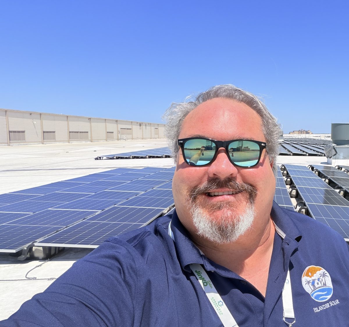 John M. Henry on a commercial rooftop solar array in Orlando